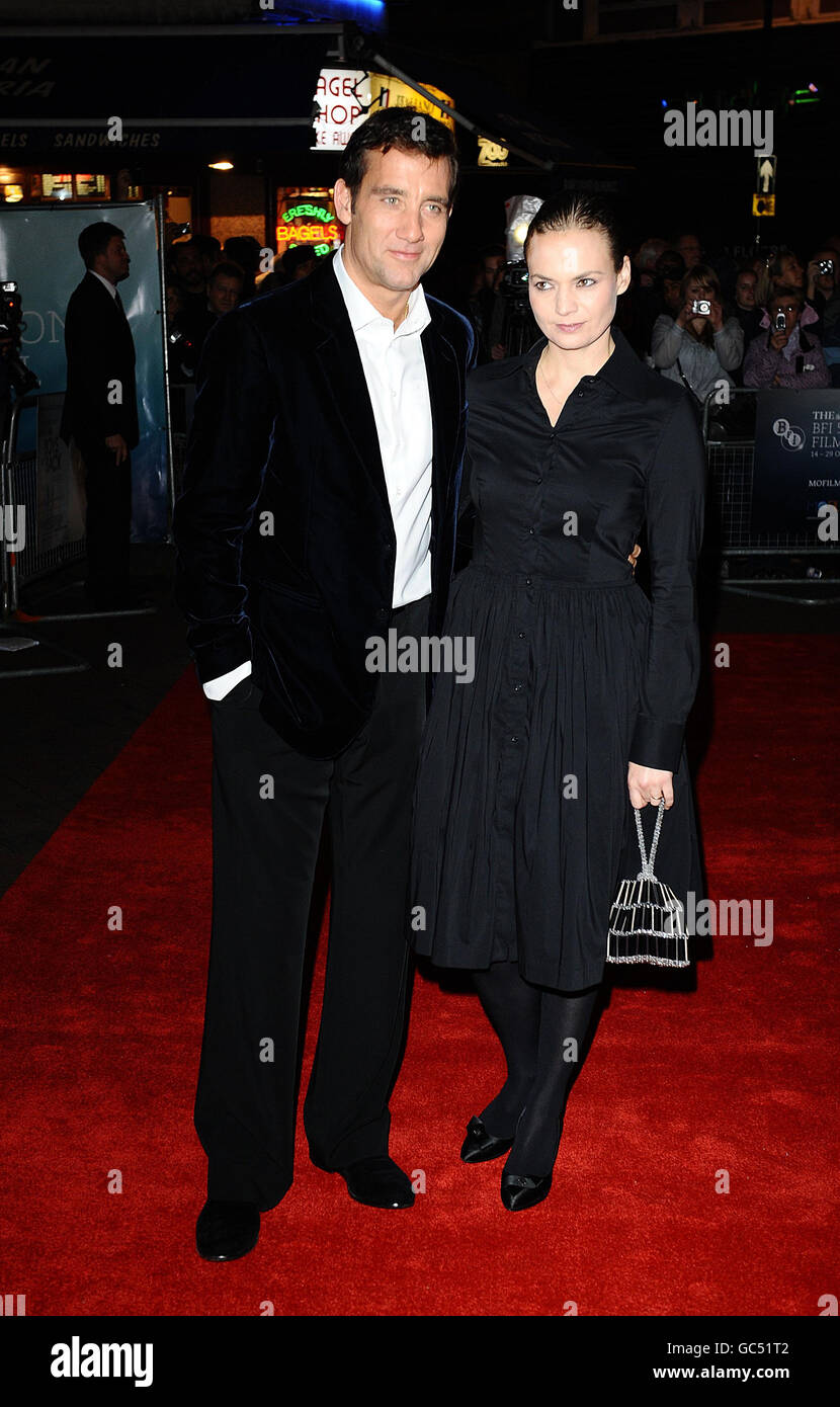 Clive Owen and wife Sarah-Jane arrive for the premiere of The Boys Are Back at the Vue West End cinema in London. Stock Photo