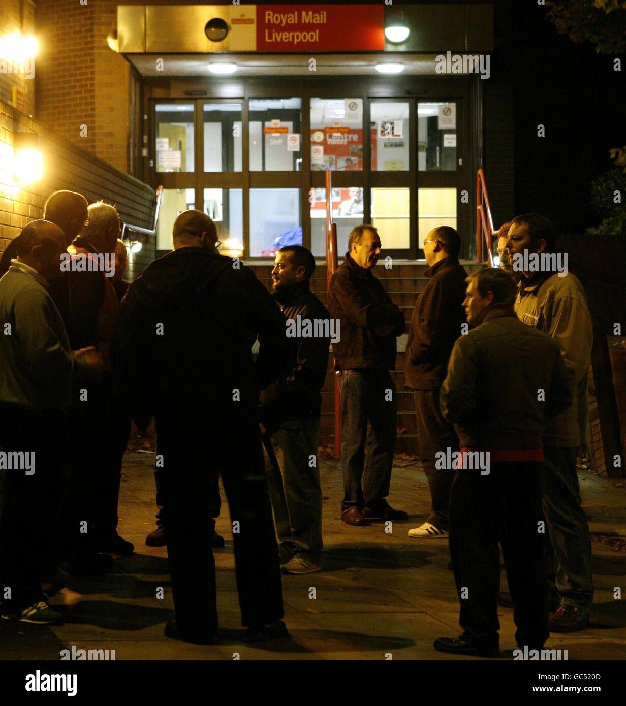 Royal Mail staff on strike stand outside Liverpool's Copperas Hill