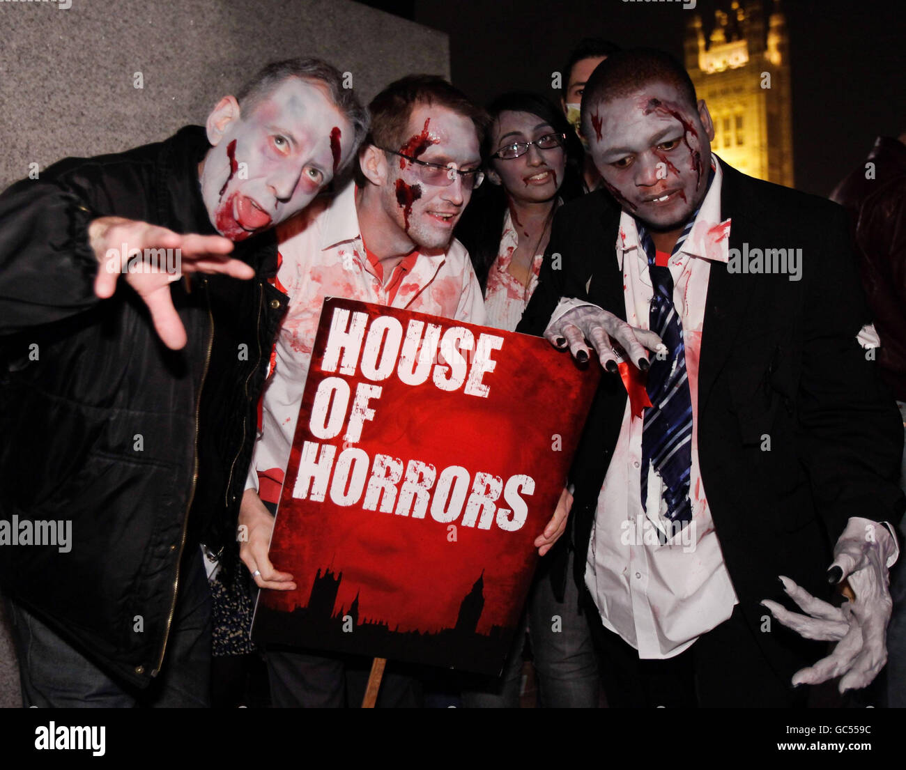 Political campaigner Peter Tatchell (left) joins campaigners dressed as undead politicians in Westminster protesting over Britain's 'Zombie Parliament.' Stock Photo
