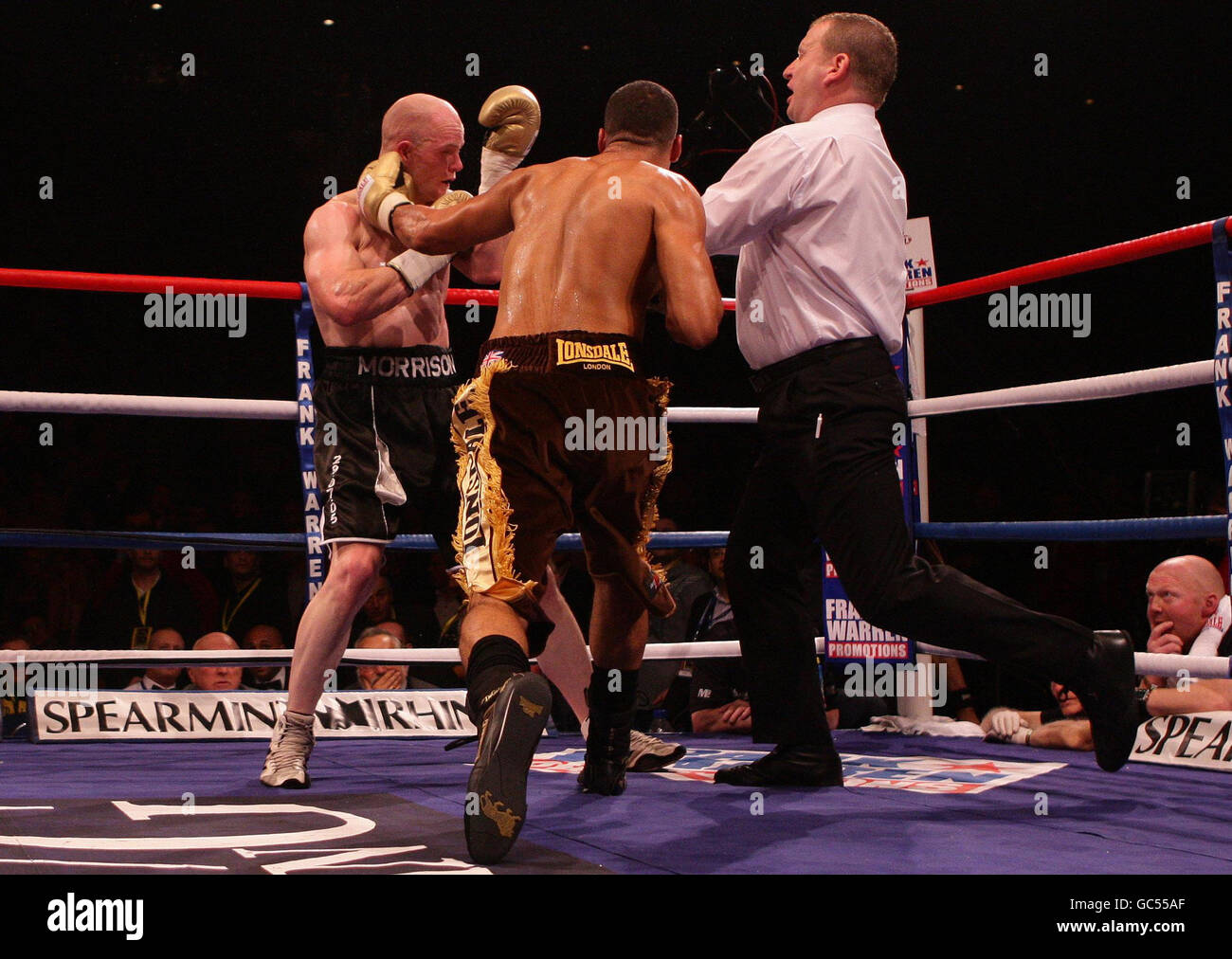 The referee (right) steps in to stop the fight between James DeGale