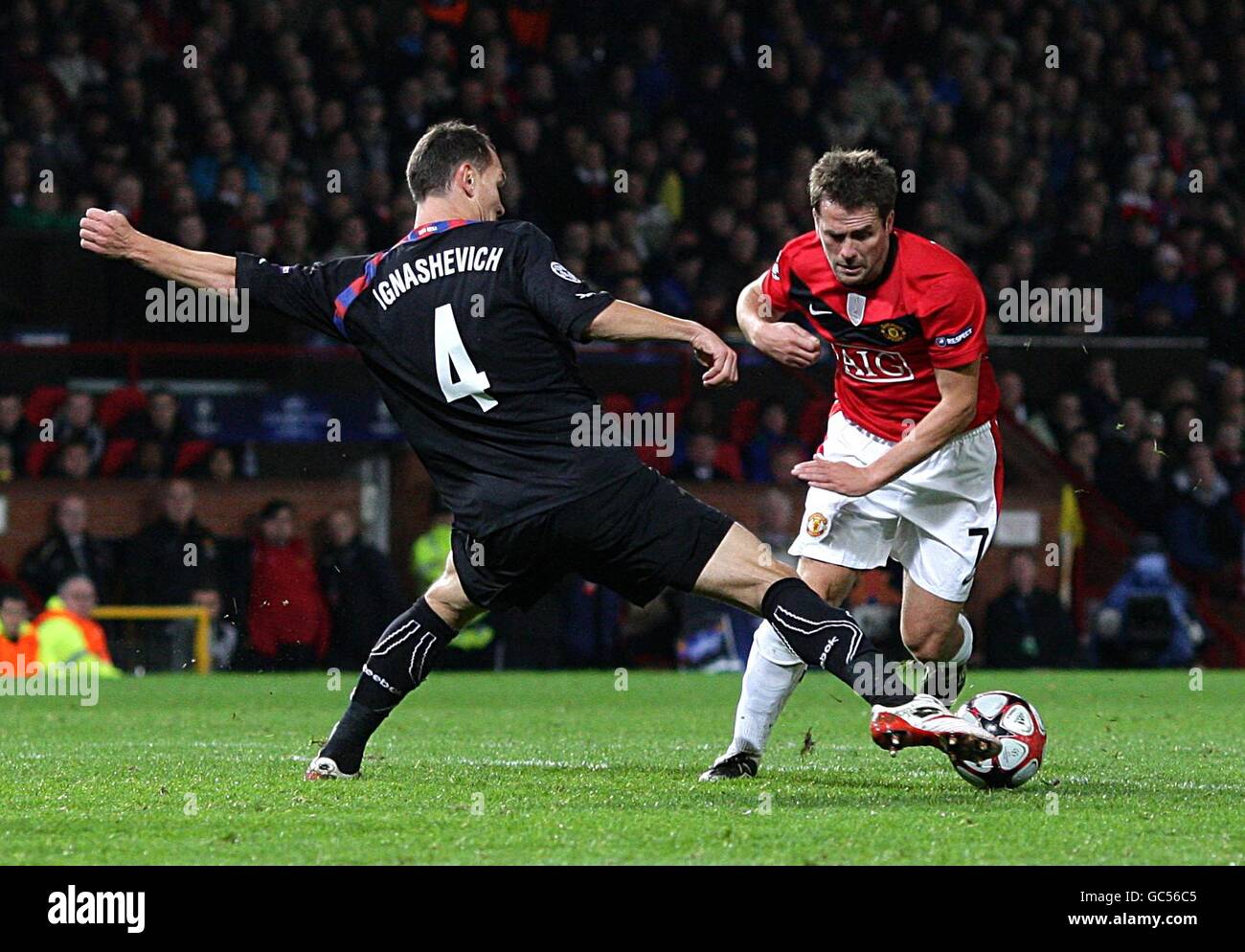 Soccer - UEFA Champions League - Group B - Manchester United v CSKA Moscow - Old Trafford. Manchester United's Michael Owen gets tackled by CSKA Moscow's Sergei Ignashevich Stock Photo