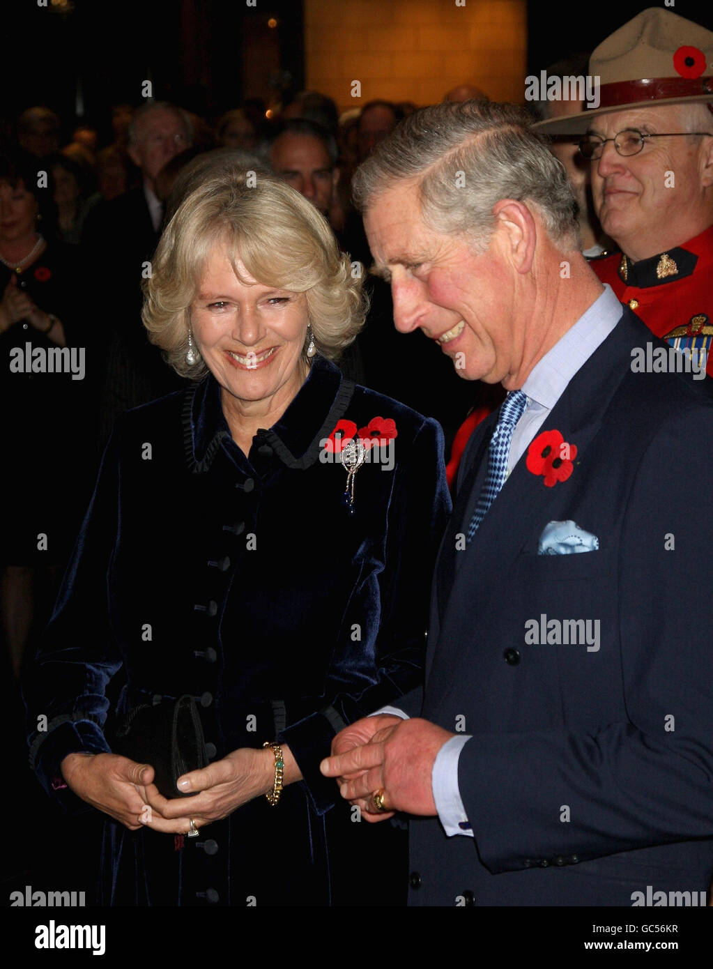 The Duchess of Cornwall and The Prince of Wales smile during a reception at 'The Rooms' in Saint John's, Newfoundland, as part of their visit to Canada. Stock Photo