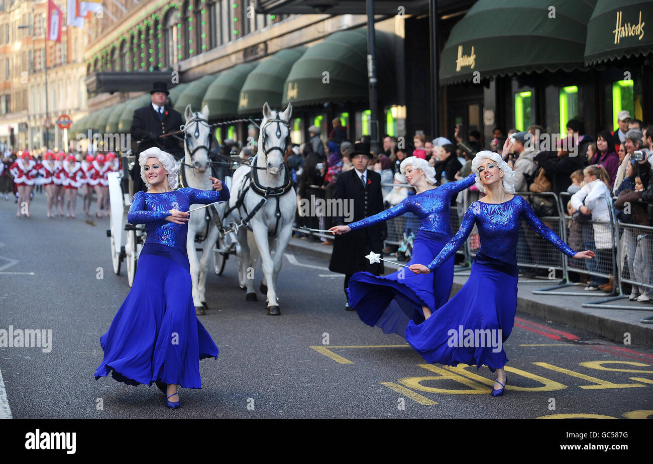 Harrods Christmas Parade London. Entertainers entertain the public