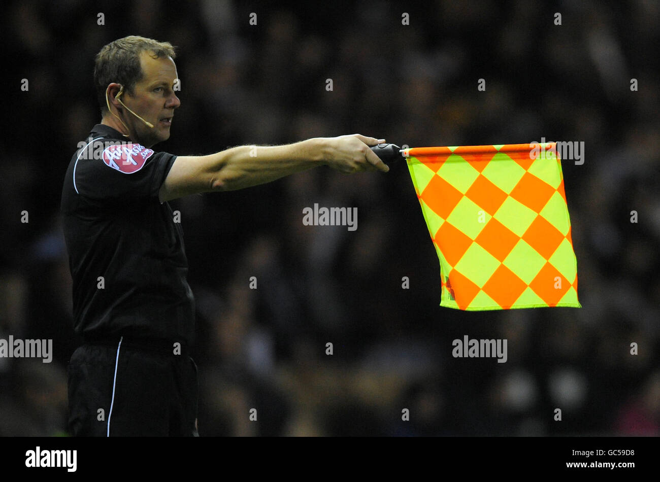 Soccer - Coca-Cola Football League Championship - Derby County v Coventry City - Pride Park Stadium. The referee's assistant raises his flag Stock Photo