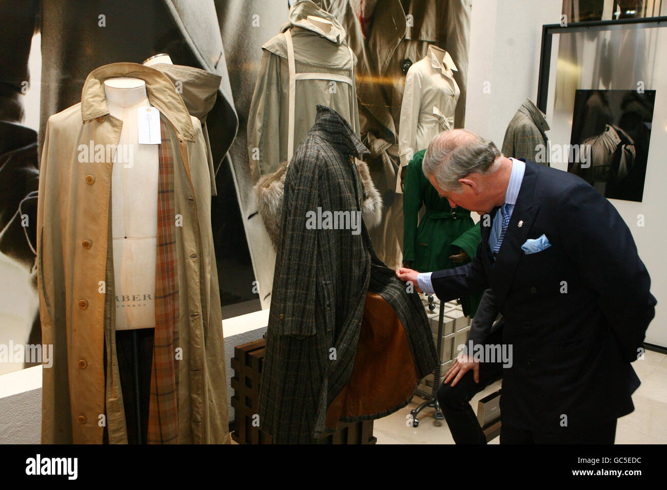 The Prince of Wales looks at archive Burberry garments as he officially  opens the new Burberry global headquarters at Horseferry House in  Westminster, central London Stock Photo - Alamy