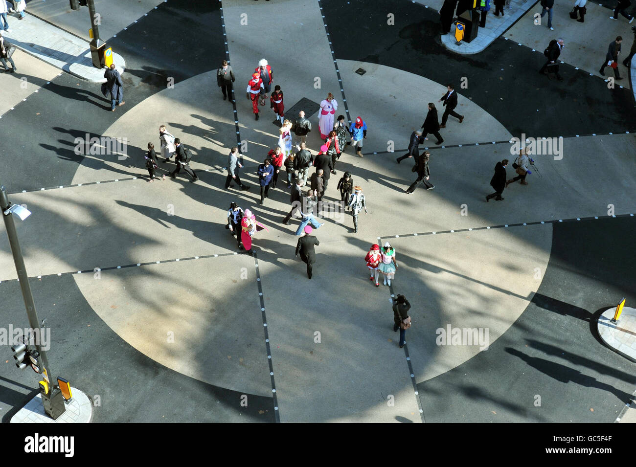 People use the new diagonal pedestrian crossing at Oxford Circus in London's West End, which was opened by Mayor of London, Boris Johnson, this morning. Stock Photo