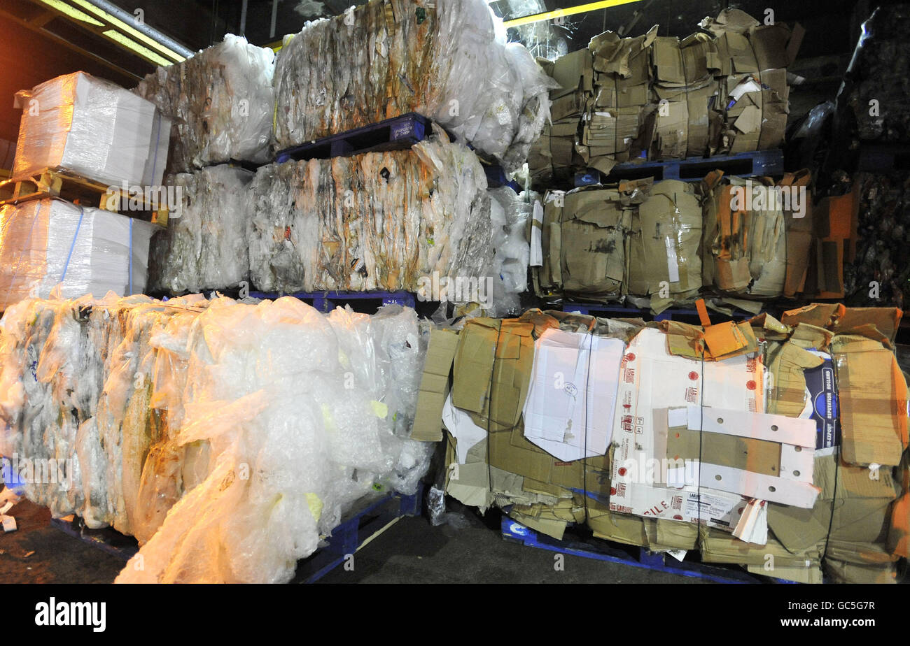 Recycling stock. Bales of cardboard and plastics ready for recycling at Earl's Court, London. Stock Photo