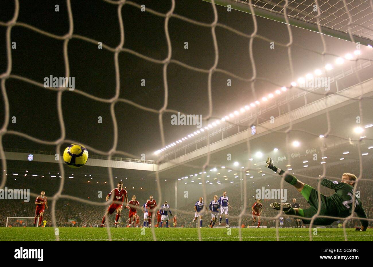 Birmingham City goalkeeper Joe Hart (right) fails to save Liverpool's Steven Gerrard goal from the penalty spot after Birmingham City's Lee Carsley concedes a Penalty for a foul on Liverpool's David Ngog Stock Photo