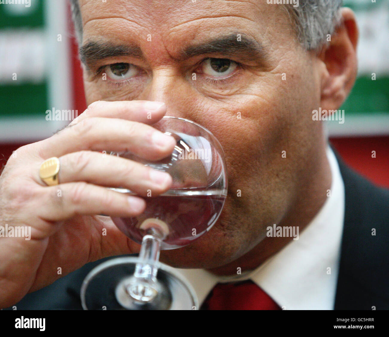 Solidarity candidate for Glasgow North by-election Tommy Sheridan pauses for a drink during a press conference at North Glasgow College. Stock Photo