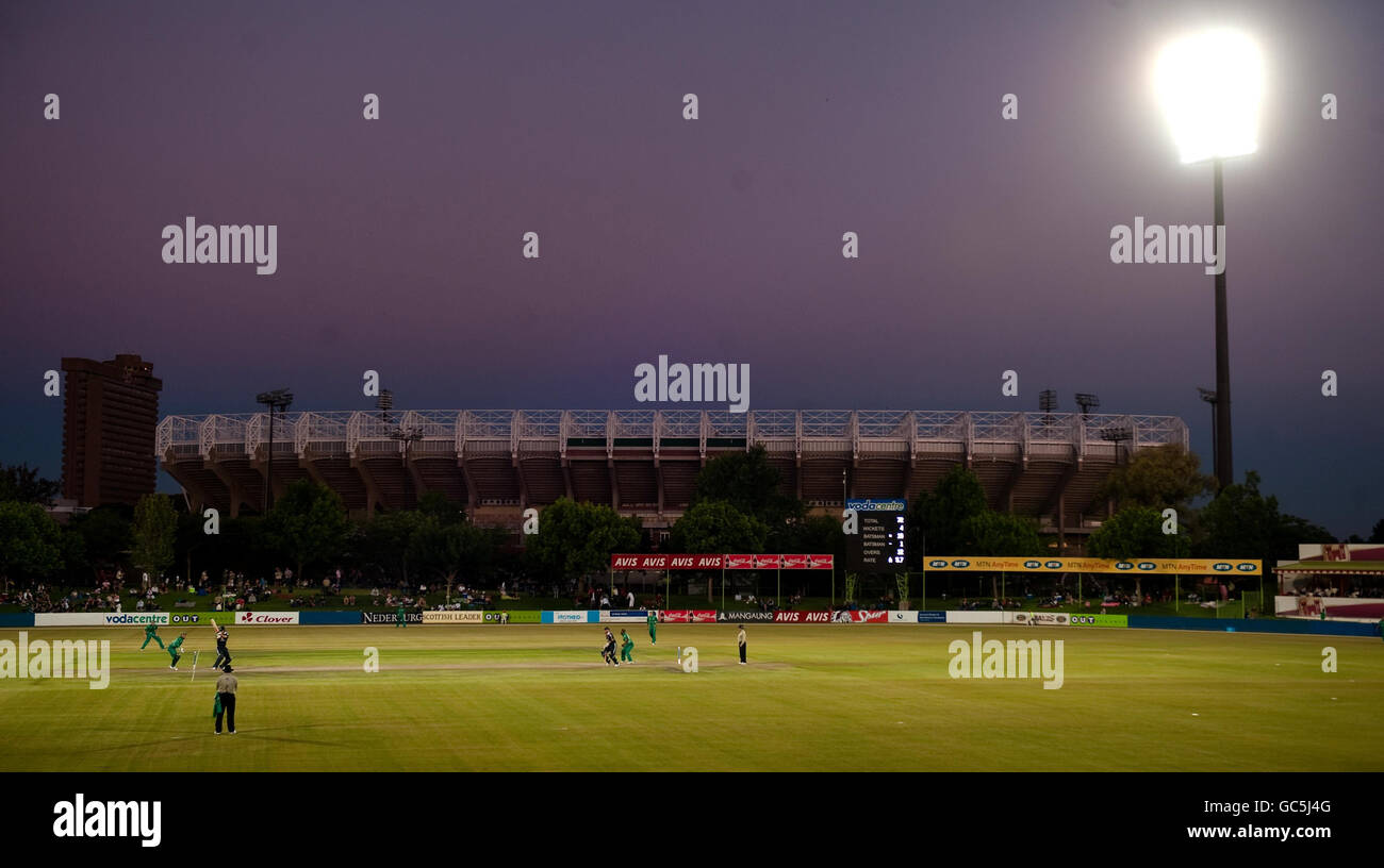 A General View of the stadium (with the World Cup 2010 Bloemfontein Free State soccer stadium in the background) as England bat under floodlights against South Africa A during the Tour match at OUTSurance Oval, Bloemfontein, South Africa. Stock Photo