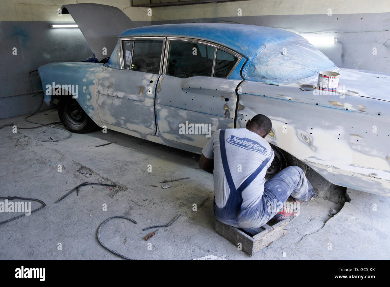 Classic American Chevrolet under restoration at NostalgiCar garage, Havana, Cuba Stock Photo