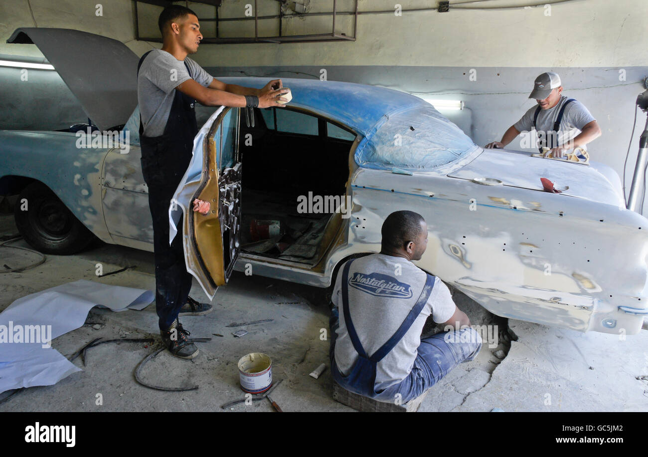 Classic American Chevrolet under restoration at NostalgiCar garage, Havana, Cuba Stock Photo