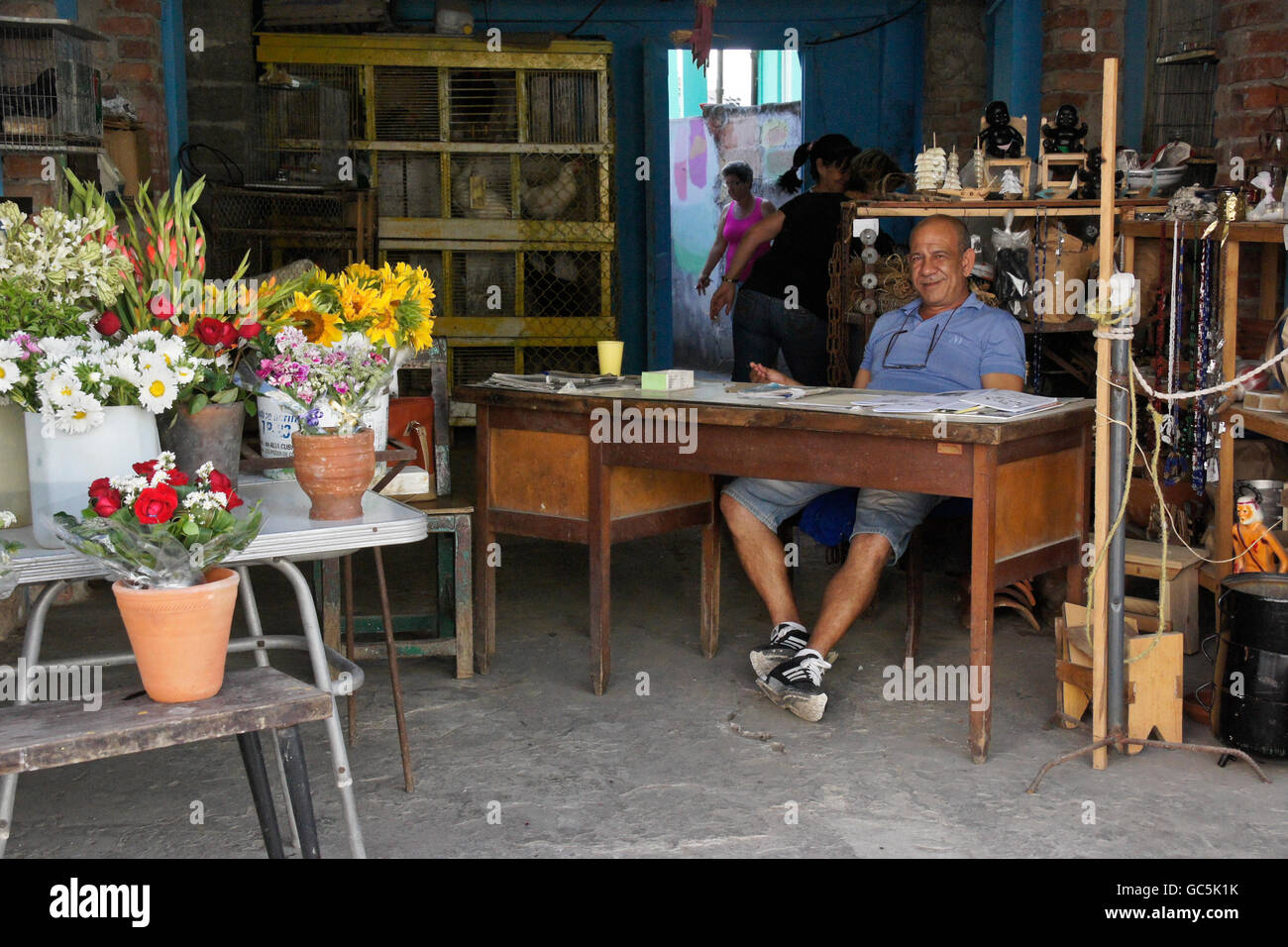 Small shop selling flowers and chickens, Regla, Cuba Stock Photo