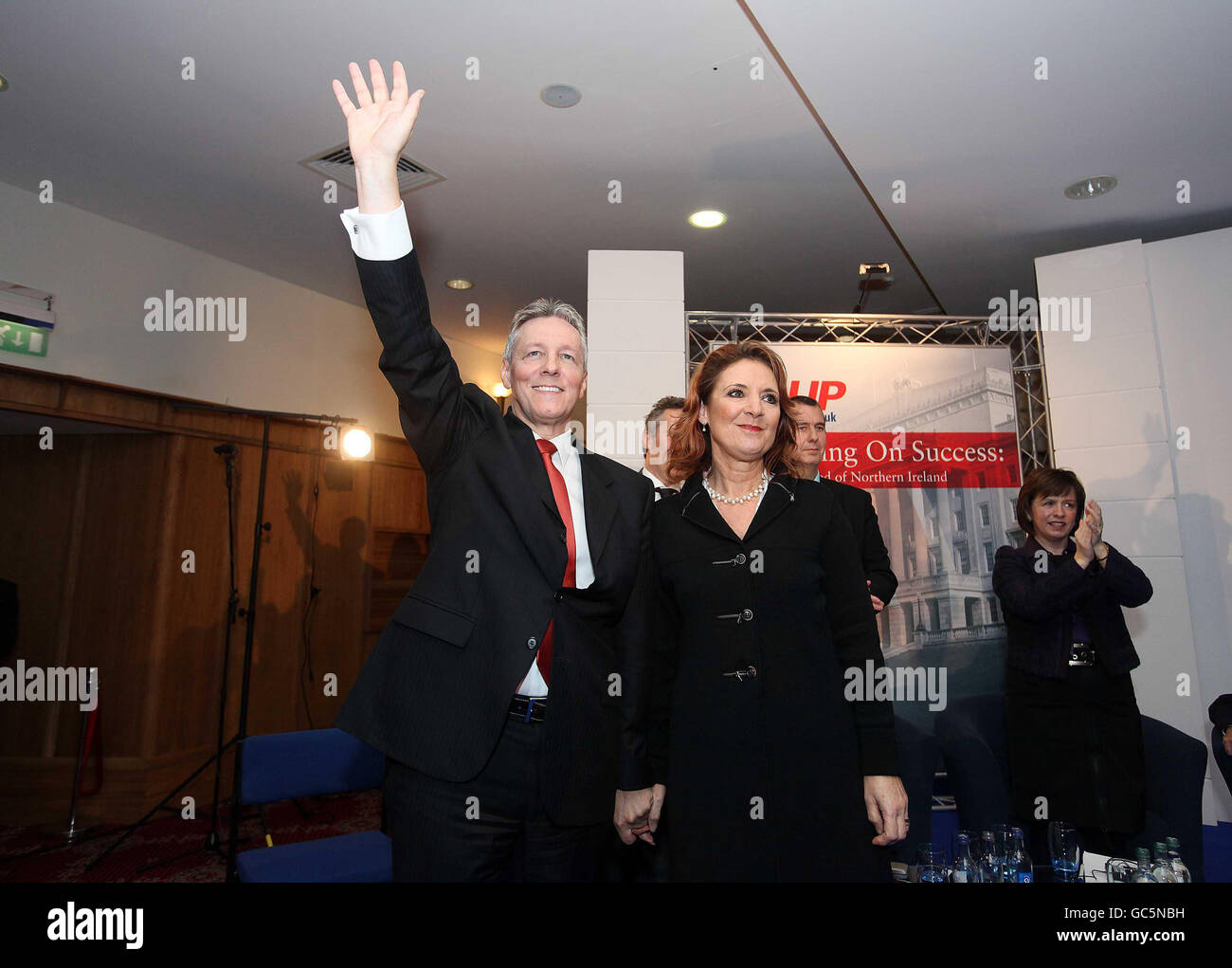 Democratic Unionist Party leader and First Minister Peter Robinson is accompanied by his wife and MP for Strangford Iris Robinson after making his speech to the DUP annual conference at the La Mon House Hotel in Co. Down. Stock Photo