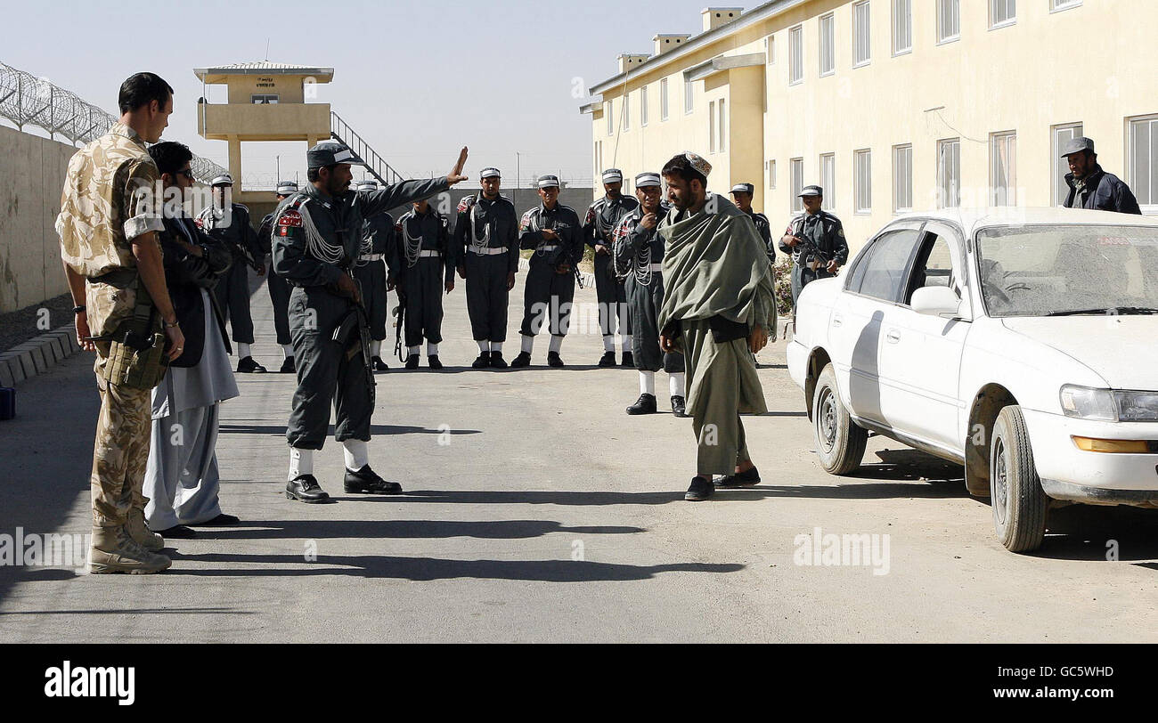 Afghan National Police train under the watchful eye of the British Army at Lashkar Gah, Afghanistan. Stock Photo
