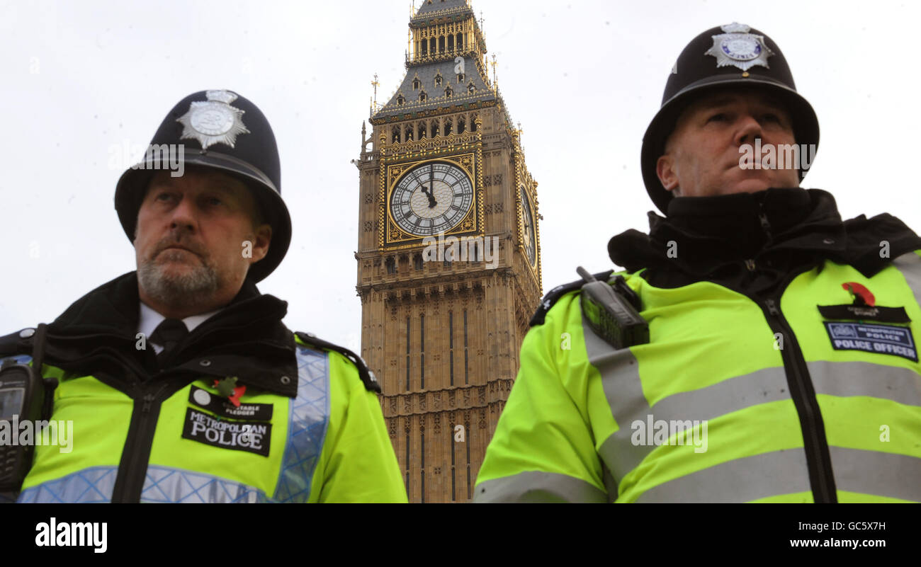 Police officers at the Houses of Parliament observe a two minute ...