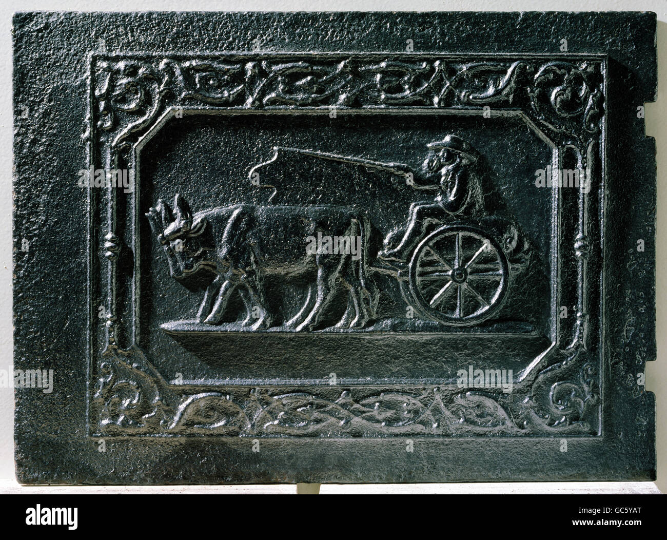 transport / transportation, coach, span of oxen, relief, cast iron, stove plate, circa 18th century, historic, historical, prince-bishop ironworks, Obereichstaett, Bavaria, Germany, arts and craft, handicrafts, metal, metals, iron, animal, animals, ox, oxen, ox cart, oxcart, bullock cart, coach, carriage, coaches, carriages, people, Additional-Rights-Clearences-Not Available Stock Photo