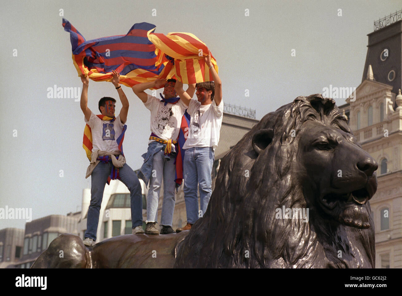 Barcelona fans waving flags from the Lions at Trafalgar Square ahead of the final at Wembley Stadium. Stock Photo