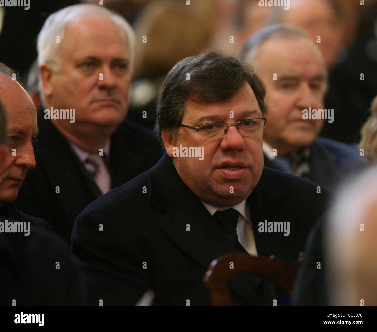 (Left to right) former Taoiseach John Bruton, Taoiseach Brian Cowen and former Taoiseach Albert Reynolds attend the funeral of Cardinal Cahal Daly, former Catholic Primate of all Ireland, at St Patrick's Cathedral in Armagh. Stock Photo