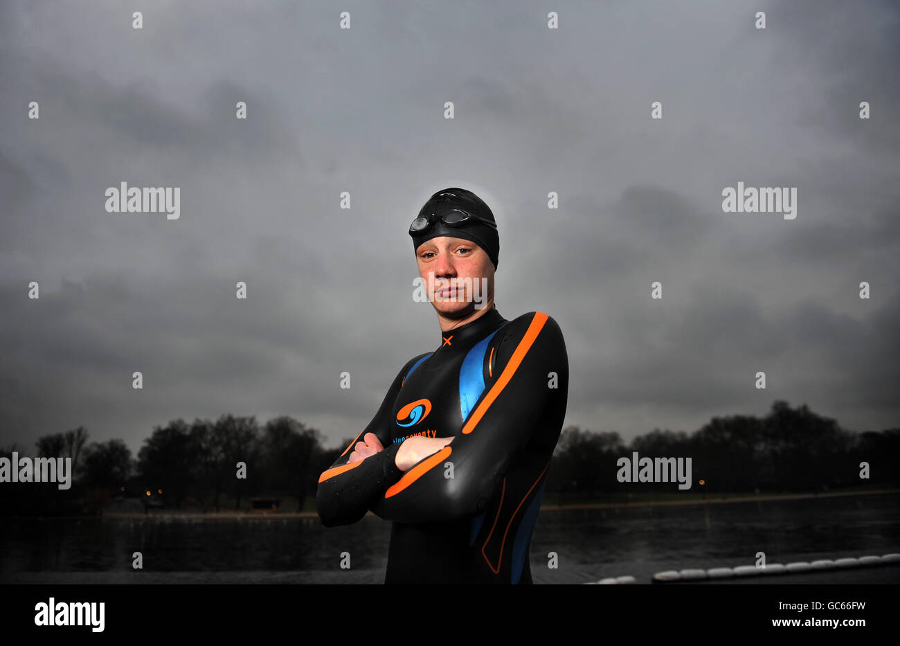 Triathlon world champion Great Britain's Alistair Brownlee poses for media during the photocall at Serpentine Lake, London. Stock Photo