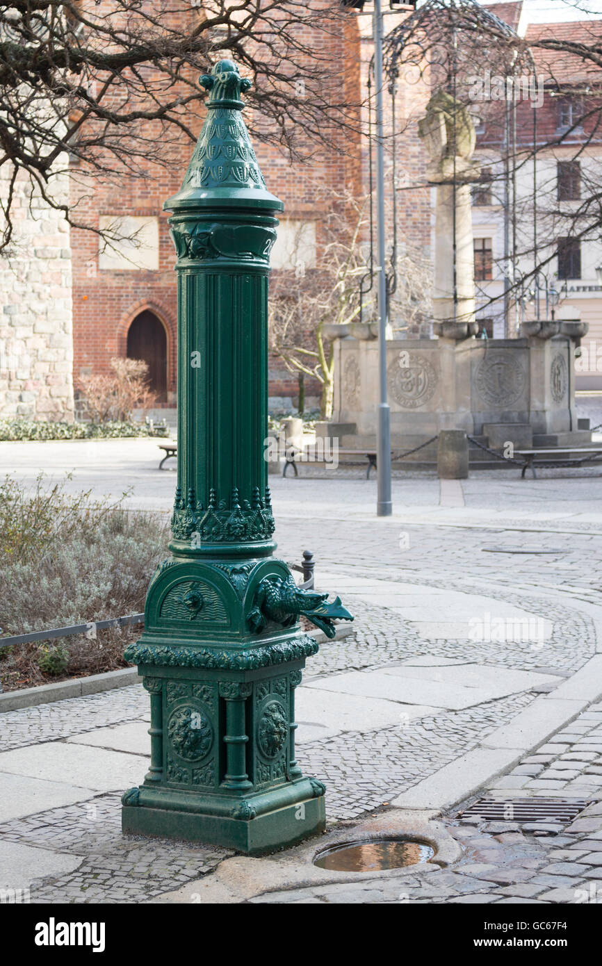 Historical water pump Poststrasse Nikolaiviertel Berlin Germany EU Stock Photo