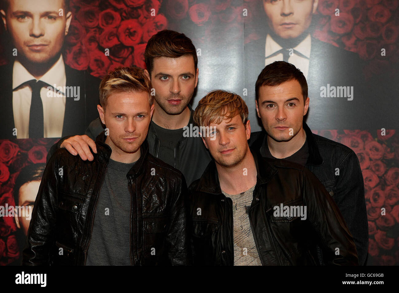 Members of boy band, Westlife (left to right) Nicky Byrne, Mark Feehily, Kian Egan and Shane Filan at the launch of their new perfume 'Westlife X' at a photocall in the Four Seasons Hotel Dublin. Stock Photo