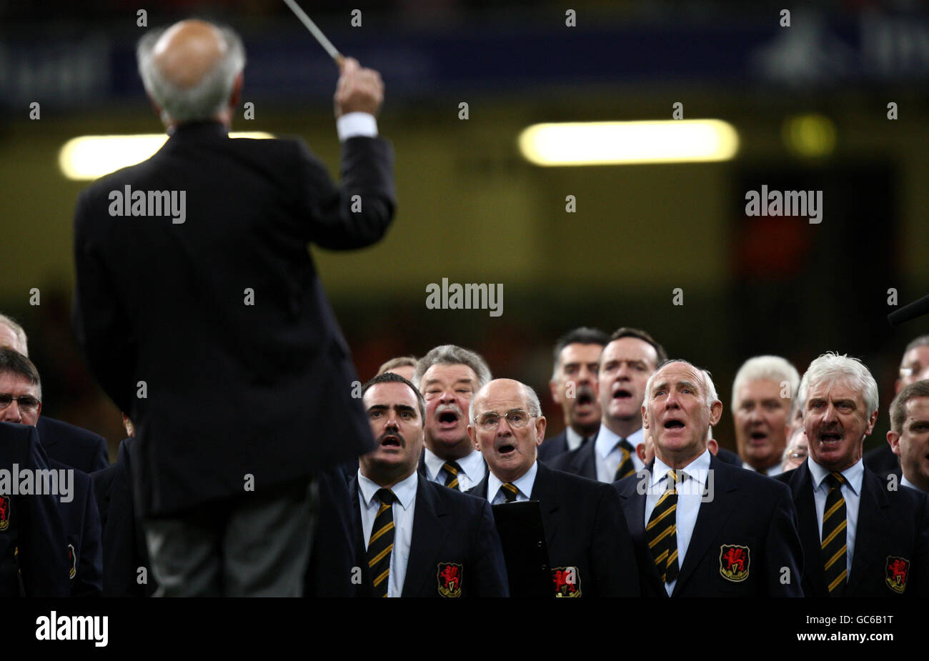 Rugby Union - Invesco Perpetual Series 2009 - Wales v Samoa - Millennium Stadium. Conductor Dr Haydn James conducts a Male Voice Choir prior to kick off Stock Photo