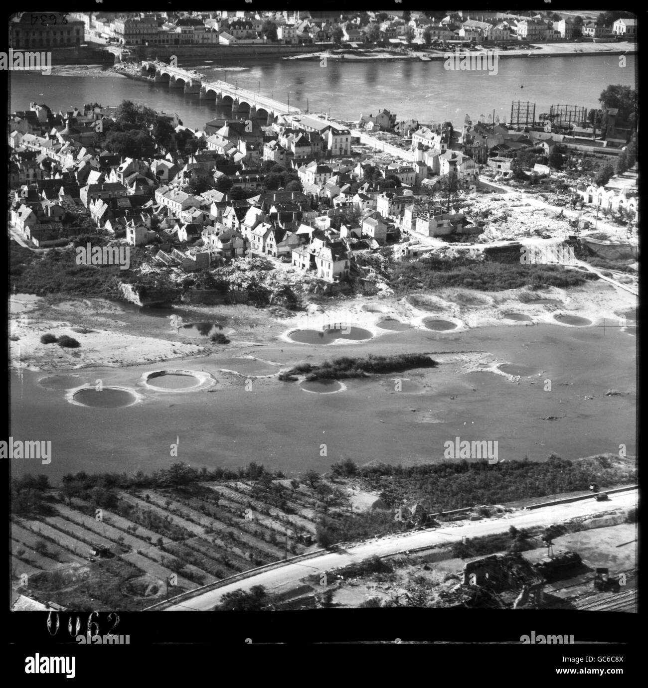 EDITORIAL USE ONLY - MANDATORY CREDIT CROWN COPYRIGHT/RCAHMS Saumur, Maine-et-Loire, France in an oblique reconnaissance photograph taken by the Royal Air Force on 2 October 1944. The picture is from The Aerial reconnaissance Archive (TARA) whose custodian is the Royal Commission on the Ancient and Historical Monuments of Scotland (RCAHMS) and which from this Monday, be available on-line to the public. Stock Photo