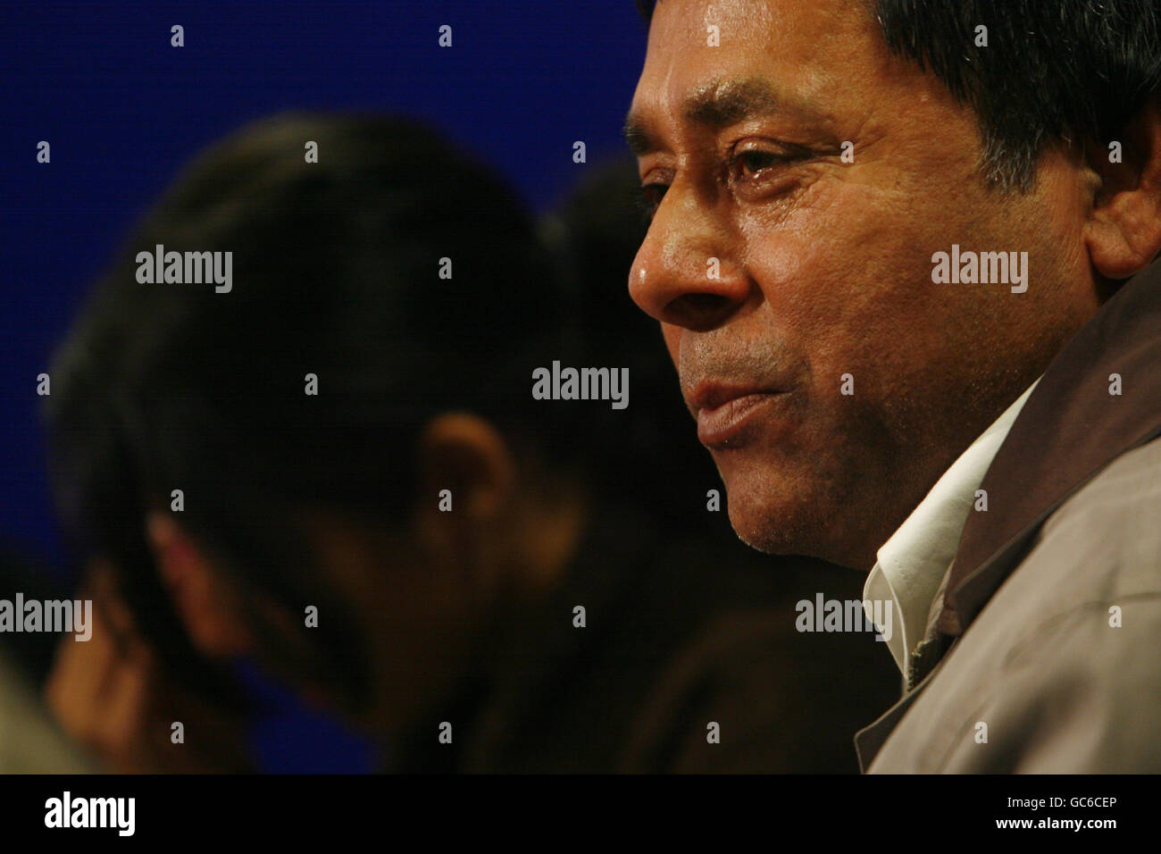 Lakhwinder Singh Shinh, (right) and Anita Shinh, the father and sister of Geeta Aulakh, 28, who was found mutilated and dying in the street by a passer-by in Greenford, north-west London, last Monday, can be seen with tears in their eyes as they speak to members of the press in Hendon, north-west London. Stock Photo