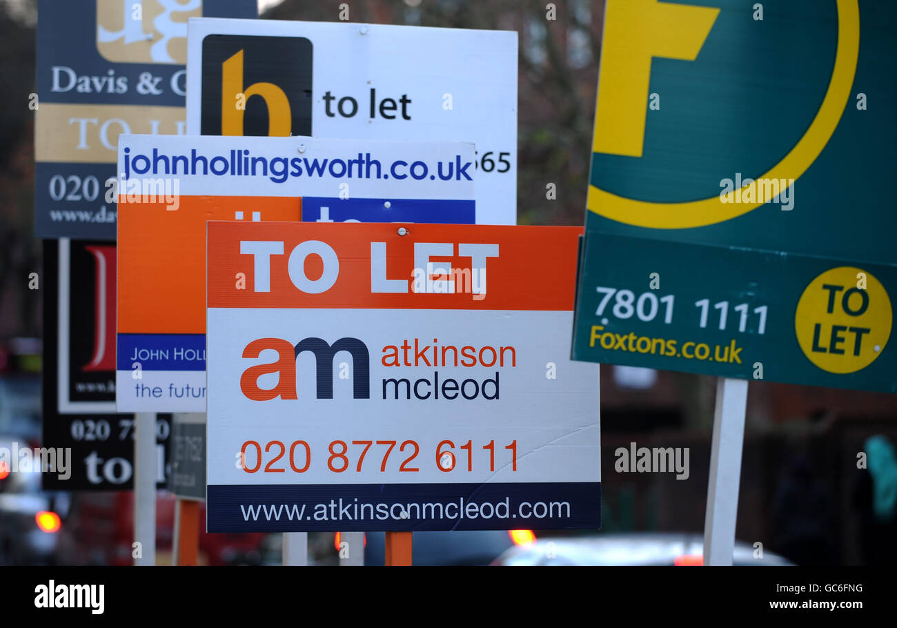 House prices. Estate agents boards are seen in Lambeth, London Stock Photo Alamy