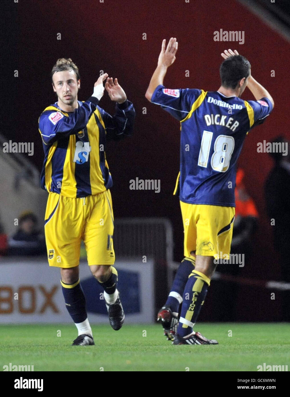 Brighton's Glenn Murray (left) celebrates their second goal during the Coca-Cola Football League One match at St Mary's, Southampton. Stock Photo