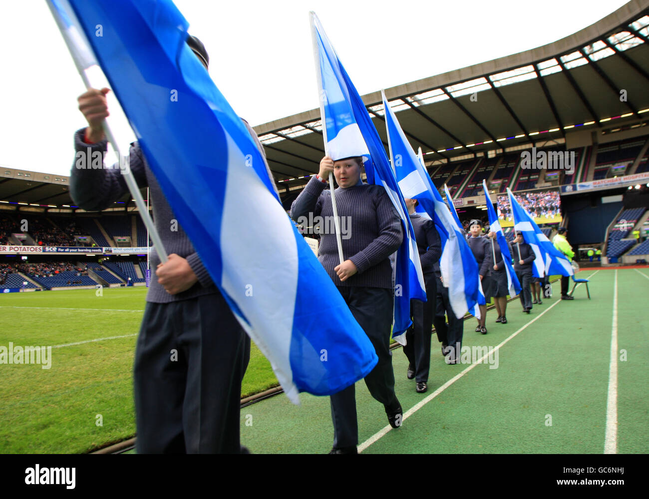 Rugby Union - 2009 Bank Of Scotland Corporate Autumn Test - Scotland v Fiji - Murrayfield. Cadets walk around the pitch with Saltire flags before kick off Stock Photo