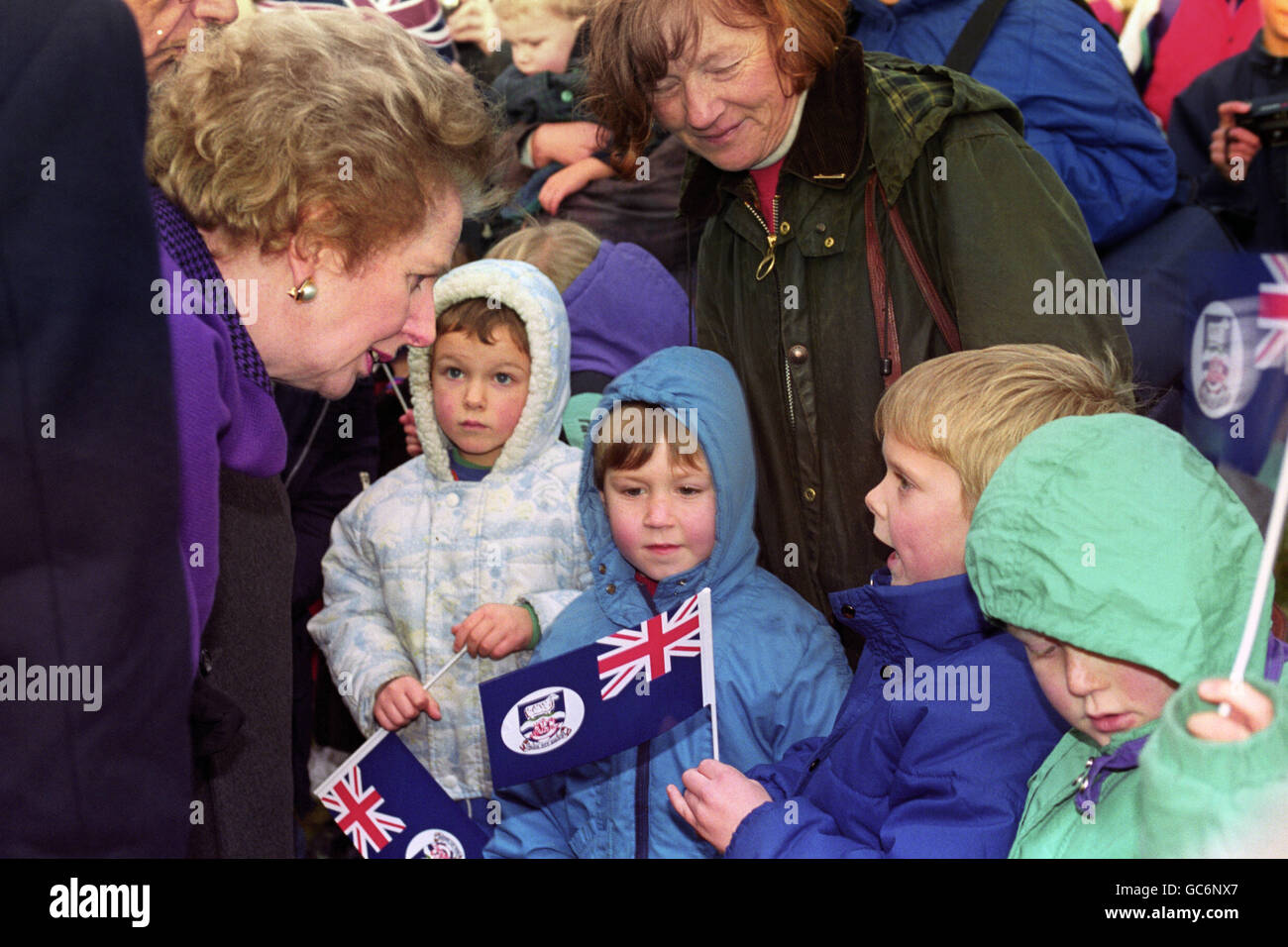 MRS. THATCHER IN PORT STANLEY FORMER P.M. MEETS CHILDREN FROM GOOSE GREEN IN PORT STANLEY DURING HER WALKABOUT. Stock Photo