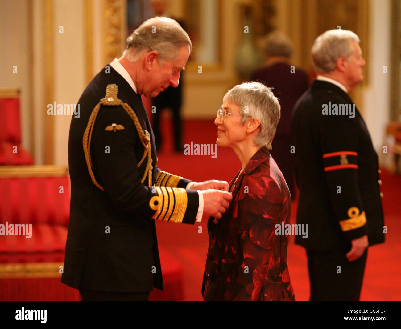 Director of sport at the University of Birmingham and chair of England Squash, Zena Wooldridge, from Stourbridge, is made an OBE by the Prince of Wales for services to sport, inside the Ballroom at Buckingham Palace in central London. Stock Photo
