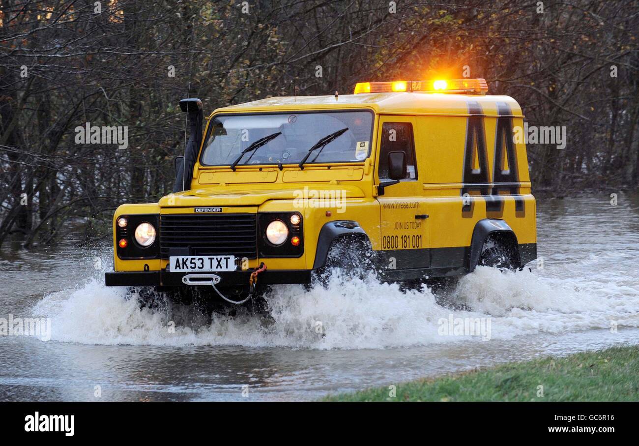 The AA rescue a car near Cockermouth, Cumbria as floods submerge large ...