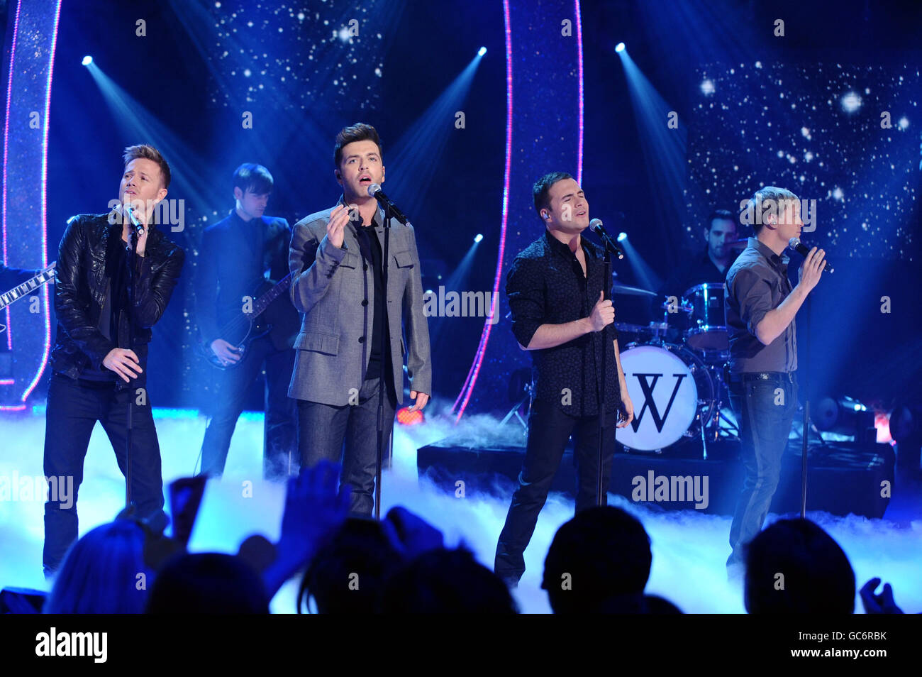 . Westlife members (left to right) Nicky Byrne, Mark Feehily, Shane Filan and Kian Egan, performing at the Children in Need appeal night at BBC Television Centre in west London. Stock Photo