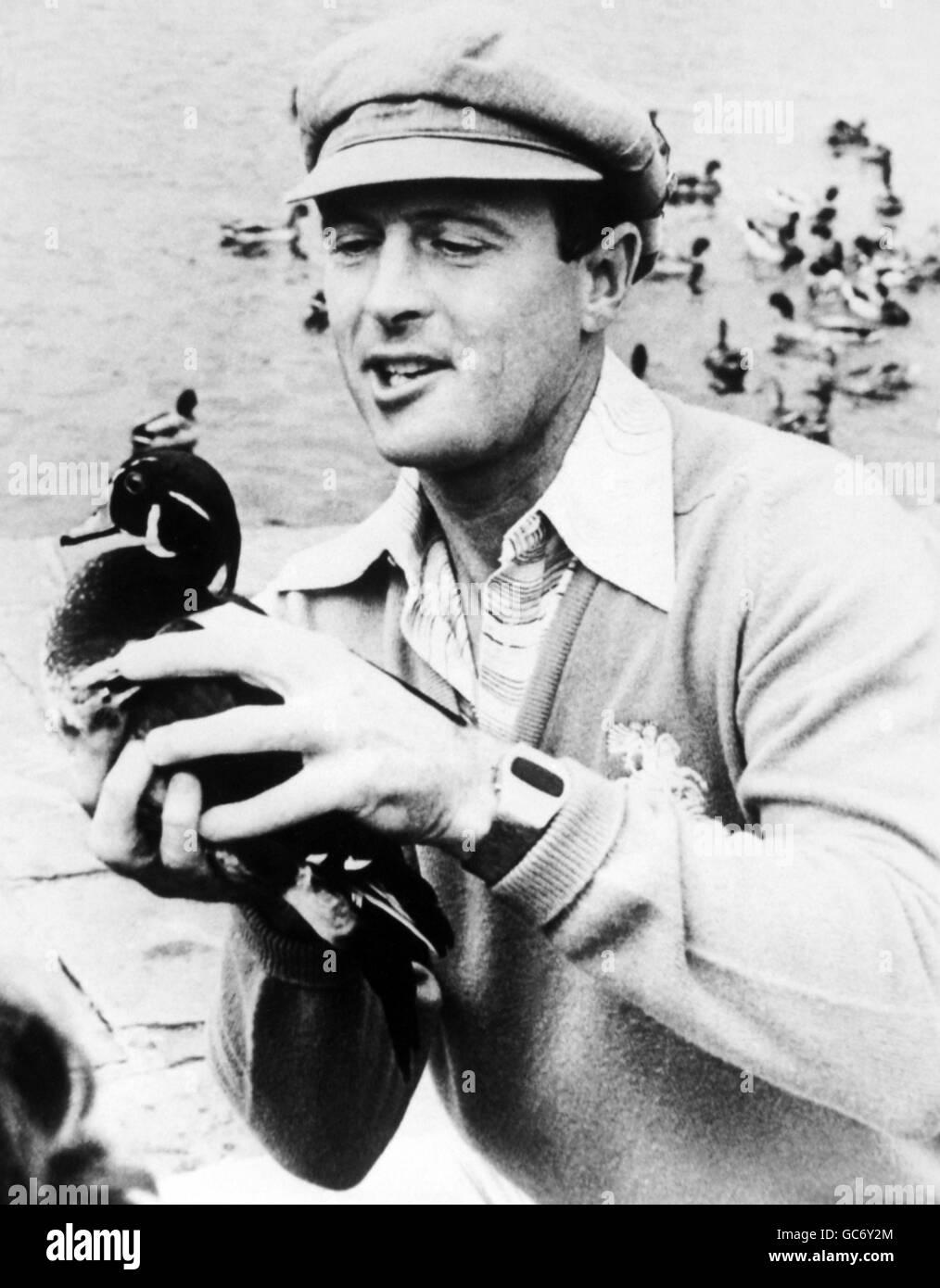 Geoff Boycott holds a duck ...The Feathered KInd Stock Photo