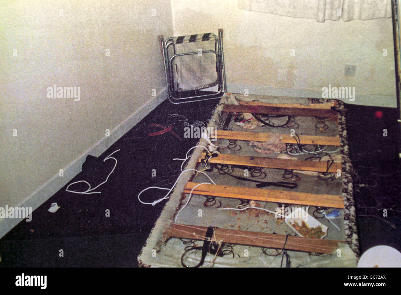 THE REMAINS OF A CHIP TAKEAWAY LIE ON THE UPTURNED BED ON WHICH SUZANNE CAPPER WAS ALLEGEDLY HELD CAPTIVE, BEFORE BEING TORTURED AND MURDERED. NOT BE PUBLISHED UNTIL SENTENCES ARE PASSED. Stock Photo