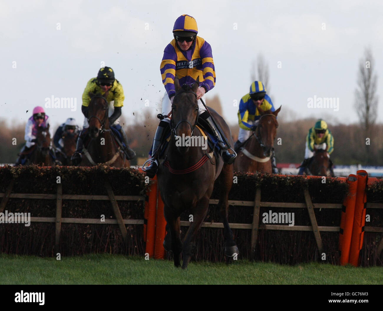 Zarrafakt ridden by Jack Doyle jumps the final hurdle to win CSP Novices' Handicap Hurdle during the The Winter Festival at Newbury Racecourse, Berkshire. Stock Photo