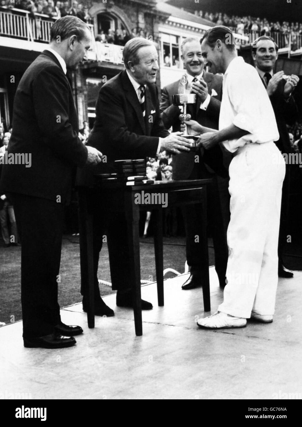 Cricket - Gillette Cup 1971 (Final) - Kent v Lancashire - Lord's Cricket Ground. Lancashire captain John David Bond (Jack) receives the Gilette Cup from President of the M.C.C. Sir Cyril Hawker Stock Photo
