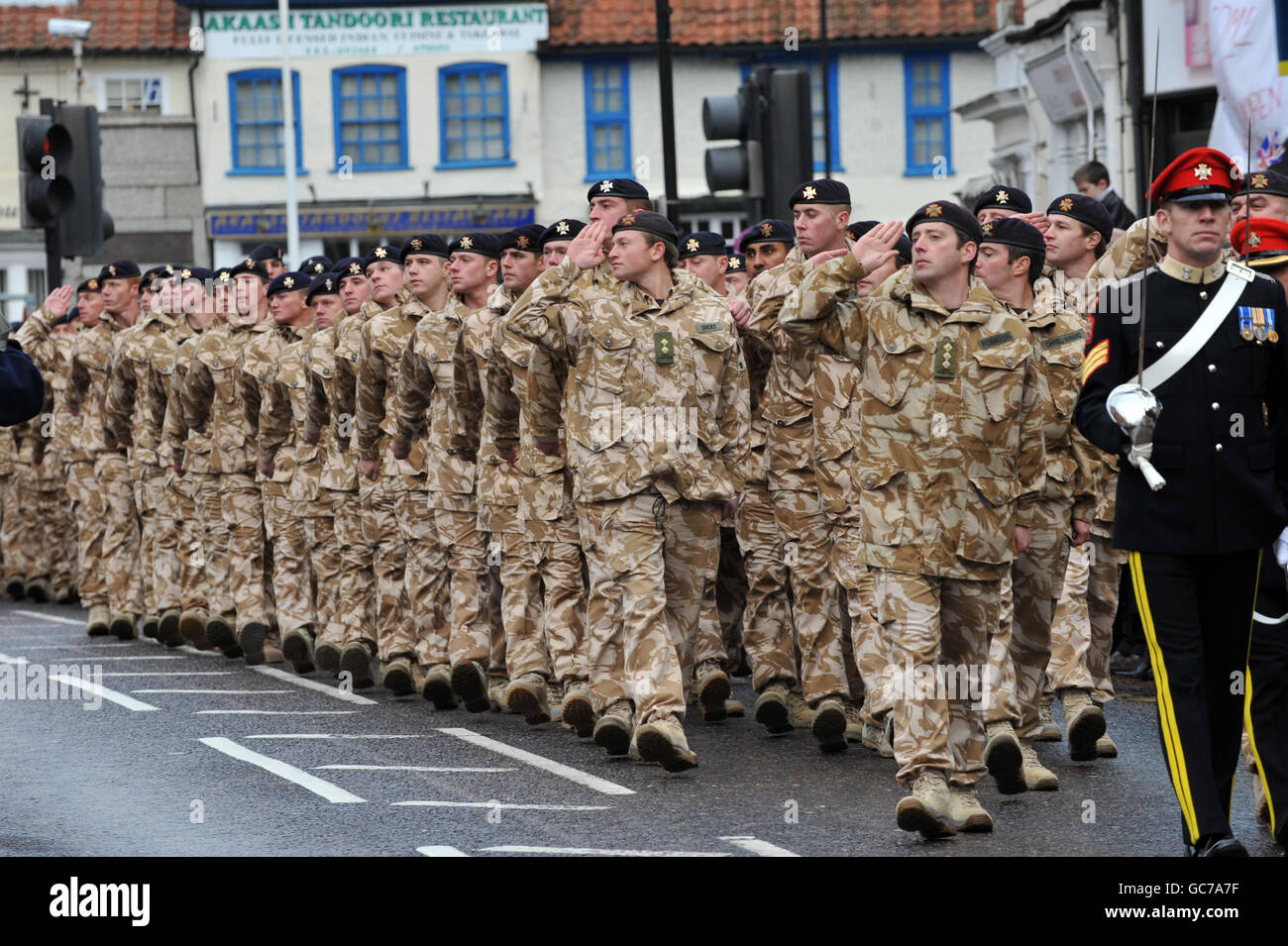Soldiers of the Light Dragoons parade through the centre of Dereham, Norfolk, following their return from duty in Afghanistan. Stock Photo