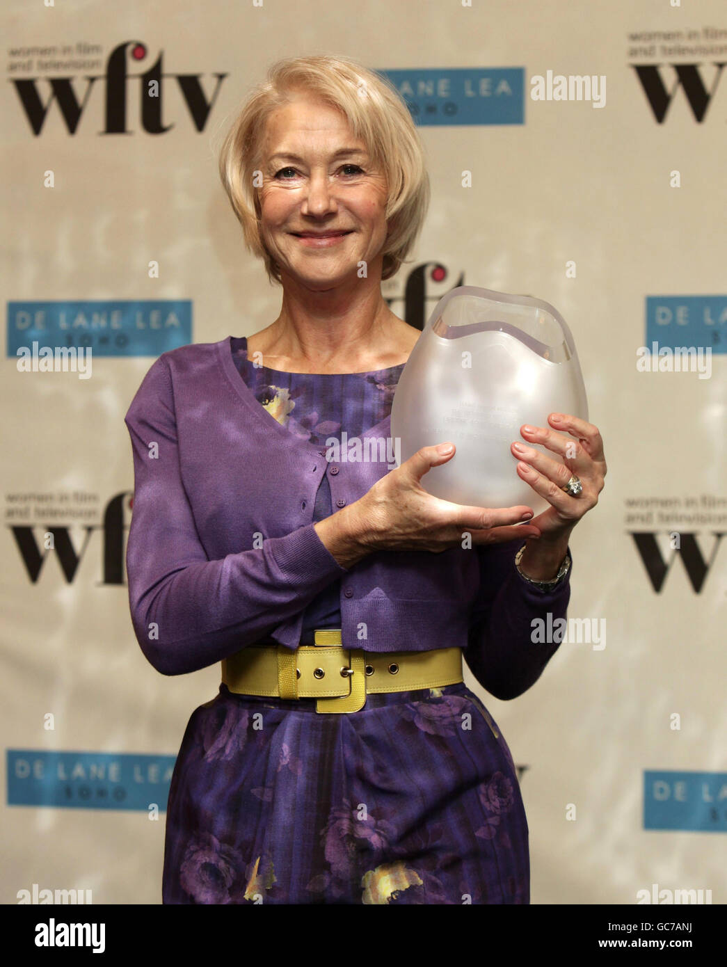 Dame Helen Mirren with the Working Title Films Lifetime Achievement Award at the Women in Film and Television Awards luncheon at the Park Lane Hilton, central London. Stock Photo