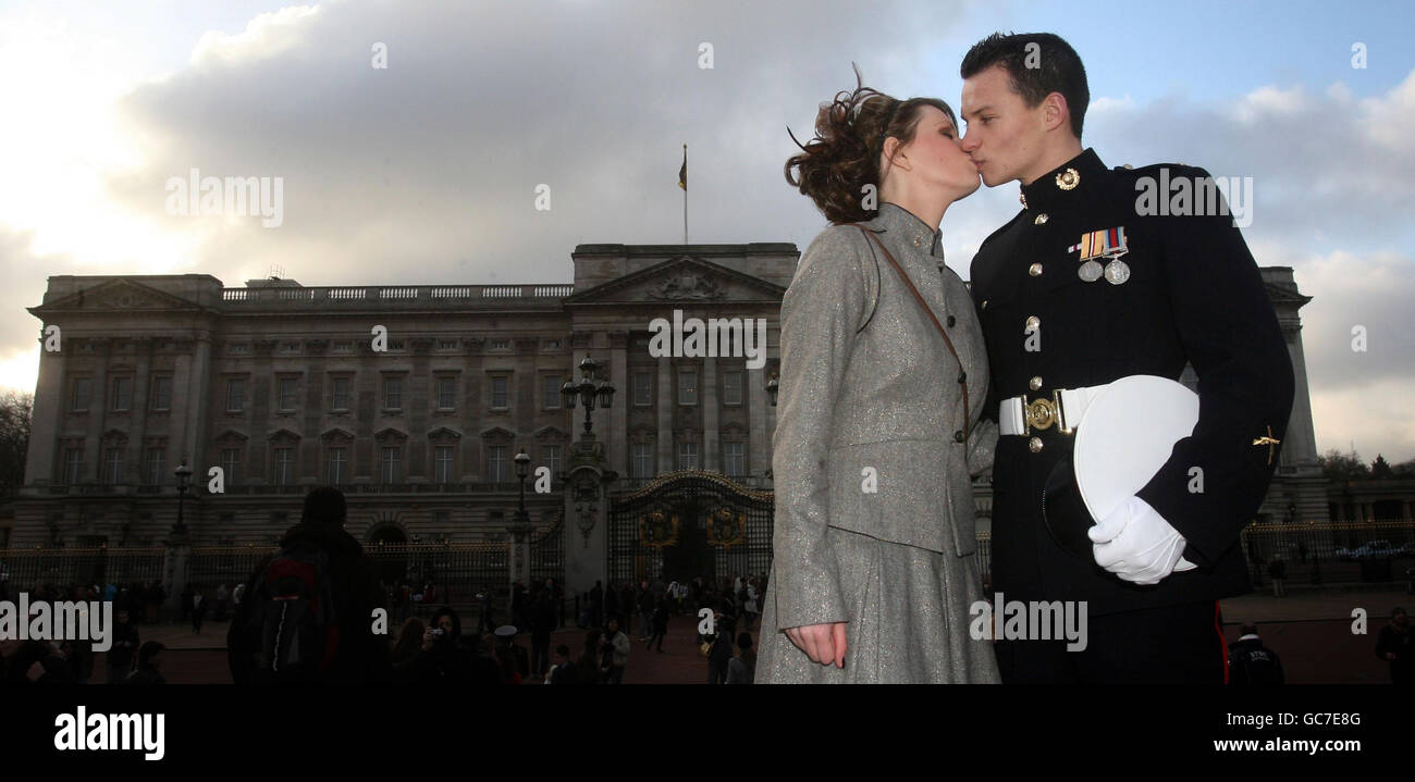 e Sacha Wilkinson who accepted his marriage proposal today after he received his award at Buckingham Palace. Stock Photo