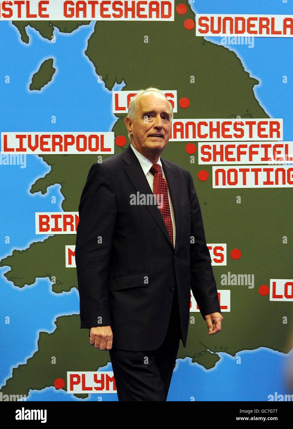 Chairman Lord Brian Mawhinney poses beside a map during the 2018 World ...