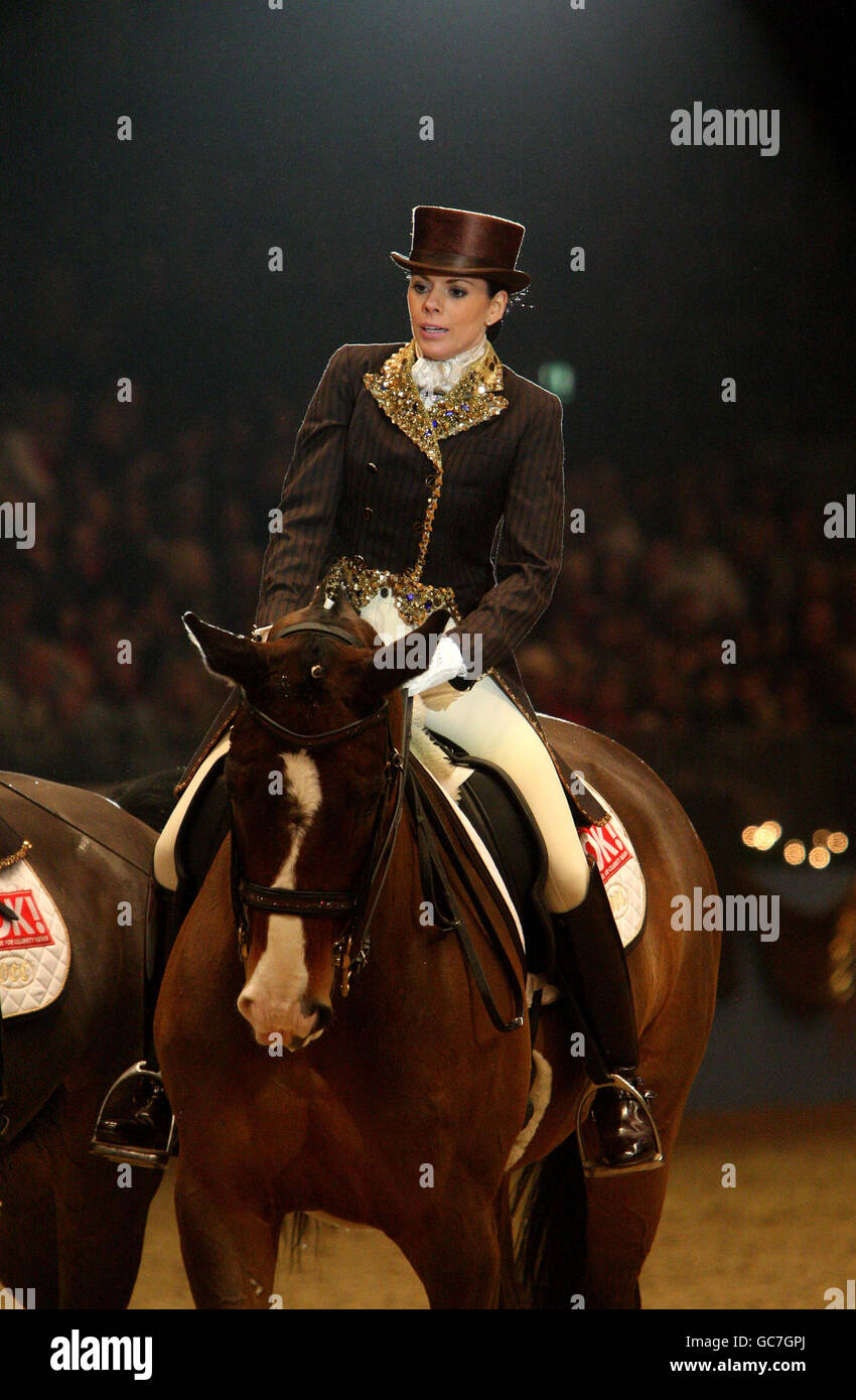 Toni Terry wife of Chelsea and England Captain John, performs dressage during the London International Horse Show at the Olympia Exhibition Centre, London. Stock Photo