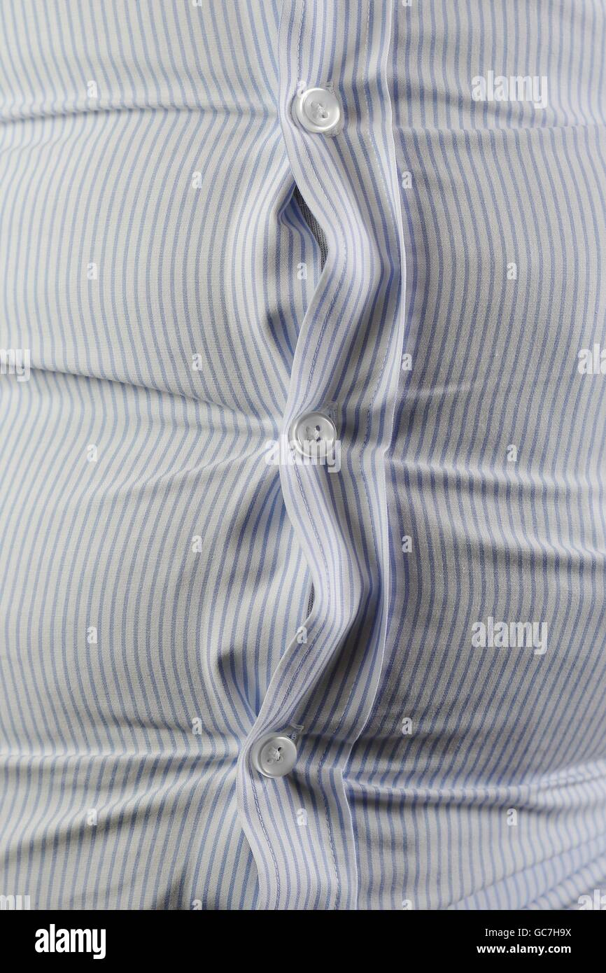 A Fat man with folding shirt Stock Photo