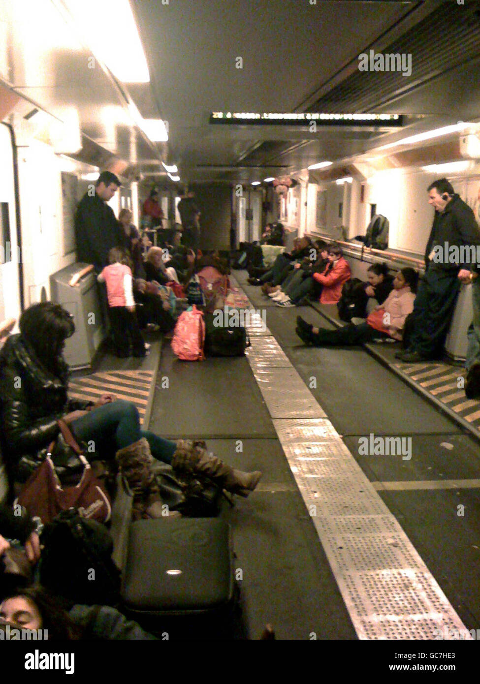 Passengers inside a Eurotunnel’s car shuttle trains after being rescued ...