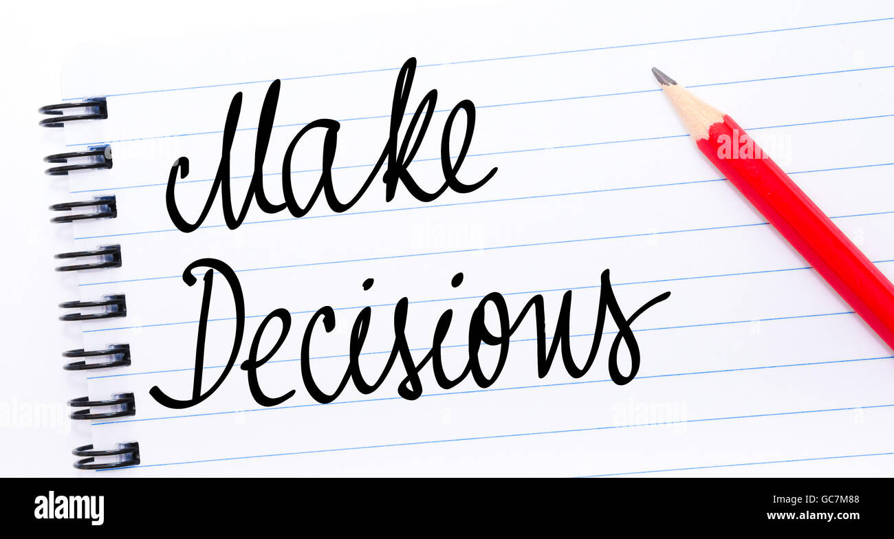 Make Decisions written on notebook page with red pencil on the right Stock Photo