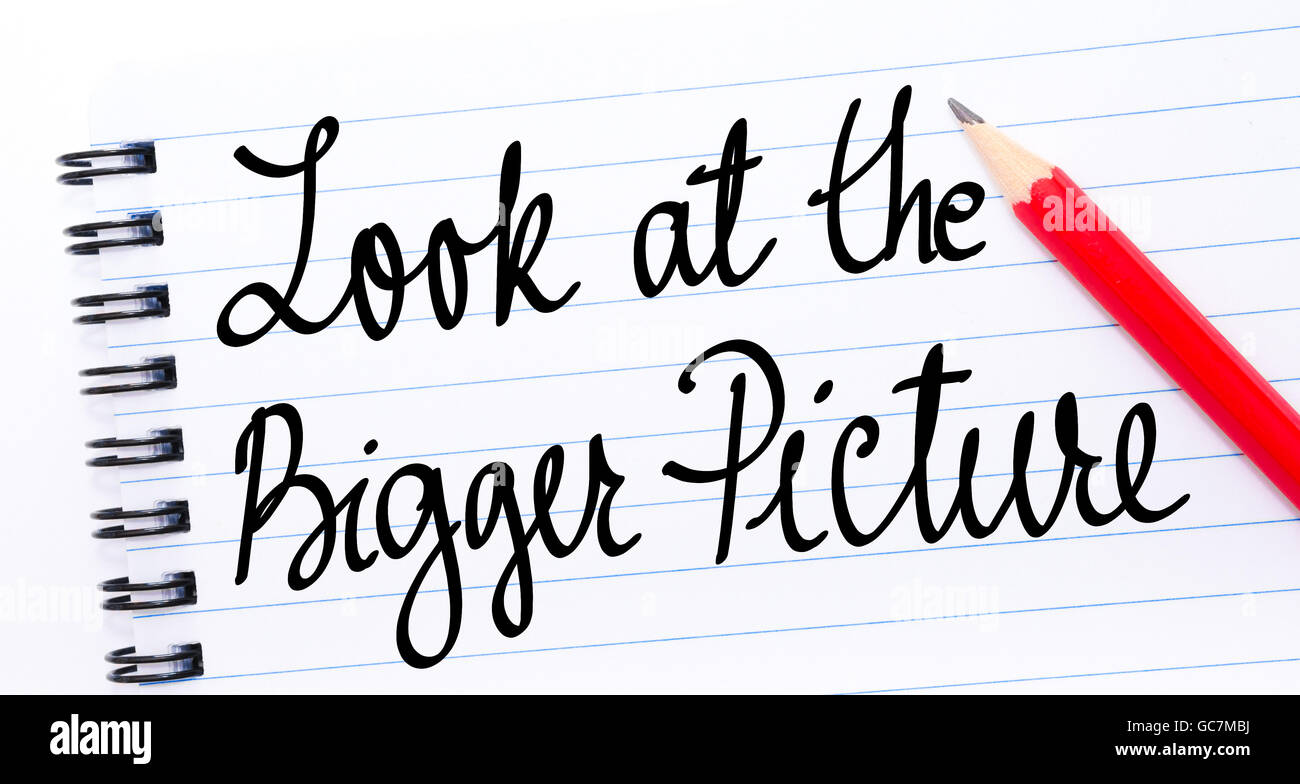 Look At The Bigger Picture written on notebook page with red pencil on the right Stock Photo
