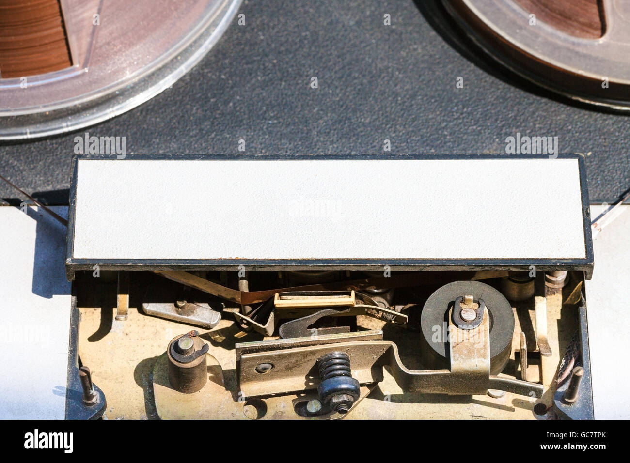 mechanical guides of reeltoreel recorder with recording tape close up